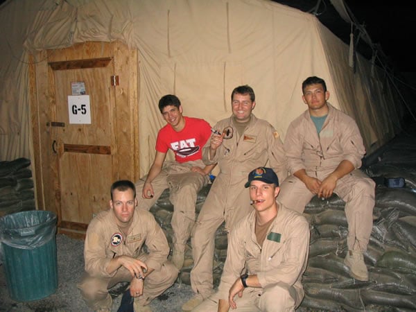 Members of Naval Security Group Activity Bahrain (NSGA Bahrain)  enjoy a post-flight smoke after completing a 10-hour mission while on deployment to Joint Task Force Horn Of Africa (JTF HOA) Djibouti in support of the Global War On Terrorism (GWOT).