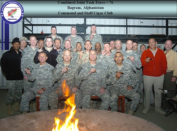 The Combined Joint Task Force Headquarters - 76 Command and Staff in Bagram Afghanistan. Every Saturday they get together after their shift to have a cigar and fellowship.