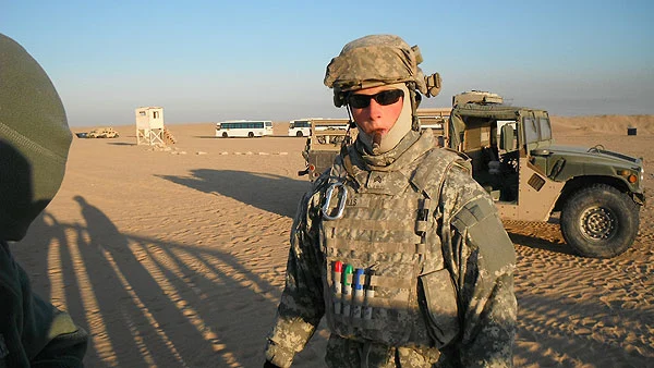 "I&rsquo;m SGT Wills in the 310th Expeditionary Sustainment Command. This photo was taken in Kuwait while I was working on the M-16 qualification range, smoking a breakfast cigar. Guns and cigars: A great way to start an ARMY day!!"
