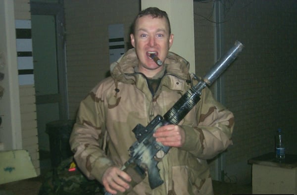 Here I am smoking a wonderful ACID Kuba Kuba from CI on Christmas Day.  This was taken as I came in off a patrol near LSA Anaconda (Balad Air Base) in which we had hit an IED and flipped our HMMWV. Luckily no one was injured. It had been raining all day and I am soaked to the skin, but nothing beats a good cigar to celebrate being alive. Keep up the good work and the fine products.Sincerely,William E. PalmerMAJ, INProvost Marshal81st BCT, WAARNG
