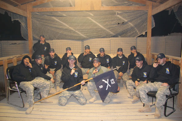 "Aloha from Iraq! I thought you would enjoy seeing a picture of our cigar club taken on Thanksgiving night, Nov 25th 2010, in Iraq. Thanks for all the great deals from CI and the fast shipments from PA to Iraq. Mahalo!"B Co 52nd InfantryHAMMERS! Iraq 2010