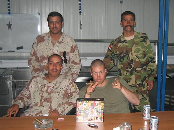 Lt Geoff Mace, Areef Ahmed, Areef Naffa and Areef Adil enjoy near beer and5 Vegas torpedoes at one of Iraq&rsquo;s best kept secrets, Camp India.