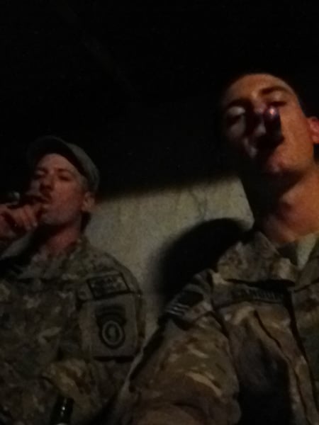 Sgt Chris Heilemann (left) and Sgt Blair Landon (right) enjoying a few Man O' War, Ruinations. Afghanistan 2013