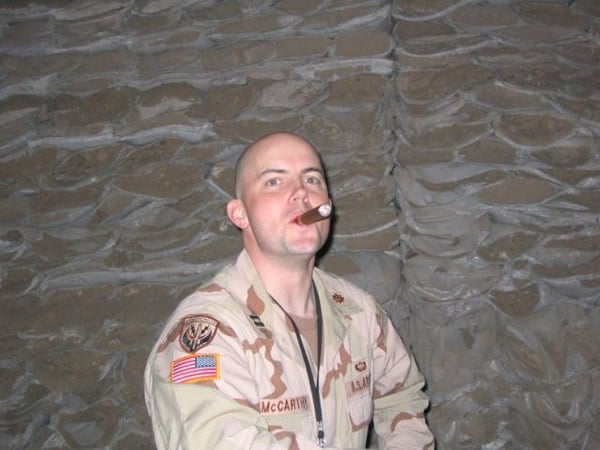 CPT Mike McCarthy, 353rd CA(ABN)BDE, Camp Slayer, Iraq, February, 2005, nightly debrief session.  Indian Tabac Limited Reserve.