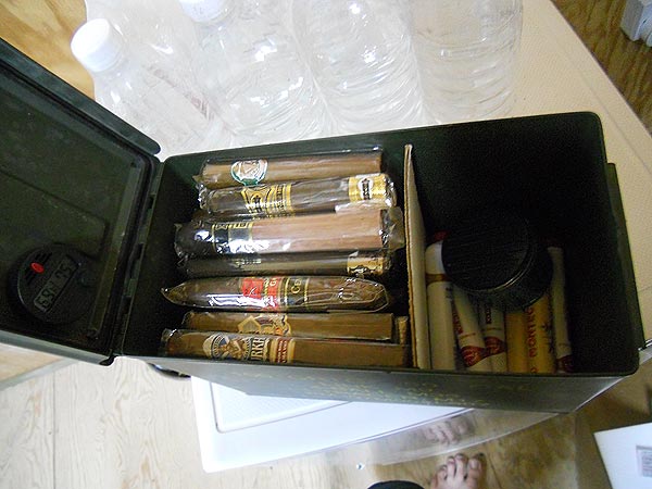 CE2 Vivian&rsquo;s humidor: "...an ammo can I converted to a humidor to keep my cigars safe and fresh as I tend to get sent around the country a lot and a typical humidor would not survive. I actually have it lined with cedar wraps I&rsquo;ve saved from various cigars and I had to cut some slits in the weatherproofing gasket so its not perfectly air tight."