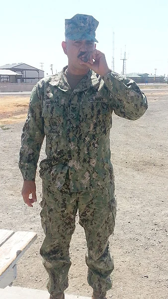 BU1 Steve Saldivar, CBMU 303 Seabees love their cigars!