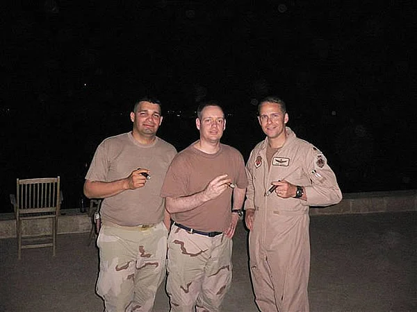 From left to right: "Cas", "Gino" and "Stich" enjoying some CI cigars in Baghdad on Memorial Day.